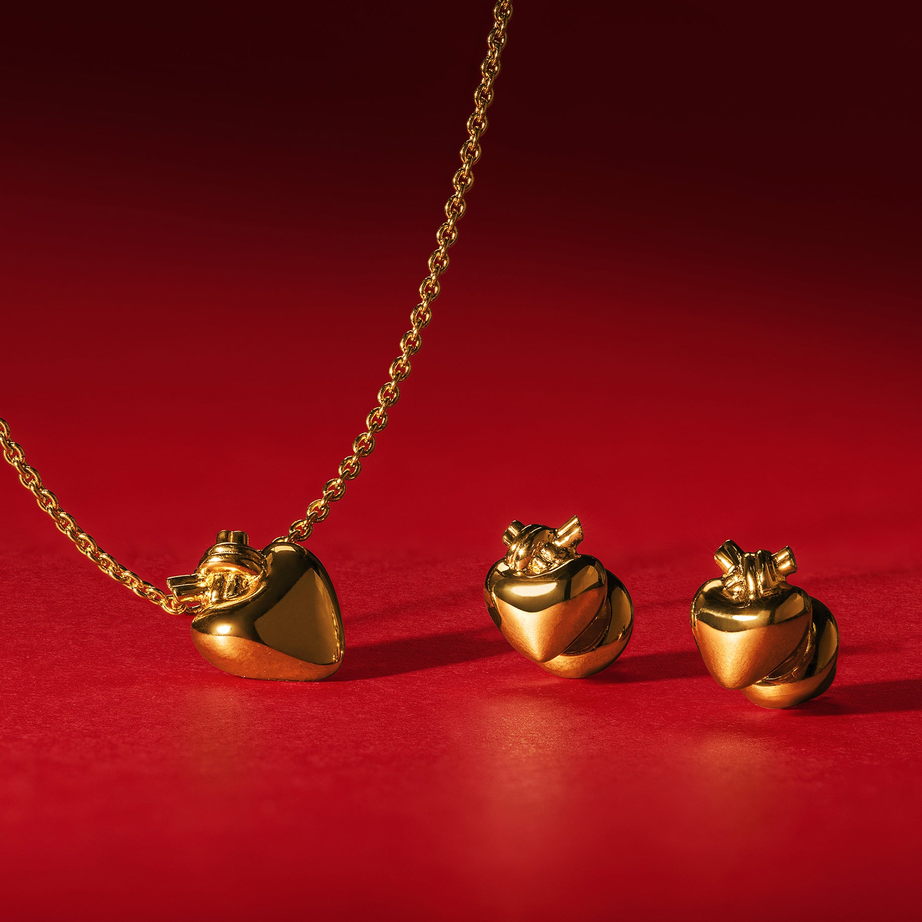 TIED HEART GOLD PENDANT