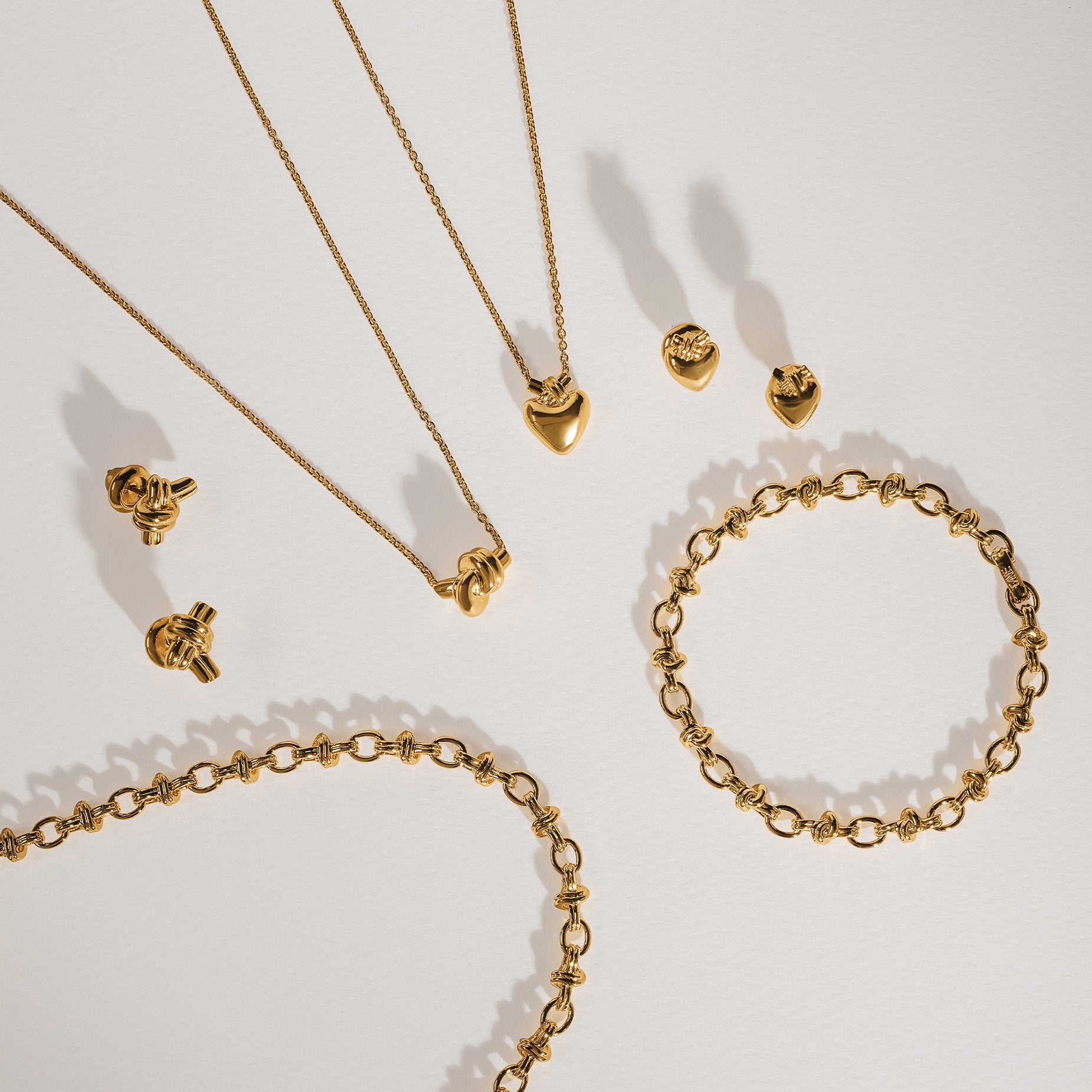 TIED HEART GOLD PENDANT