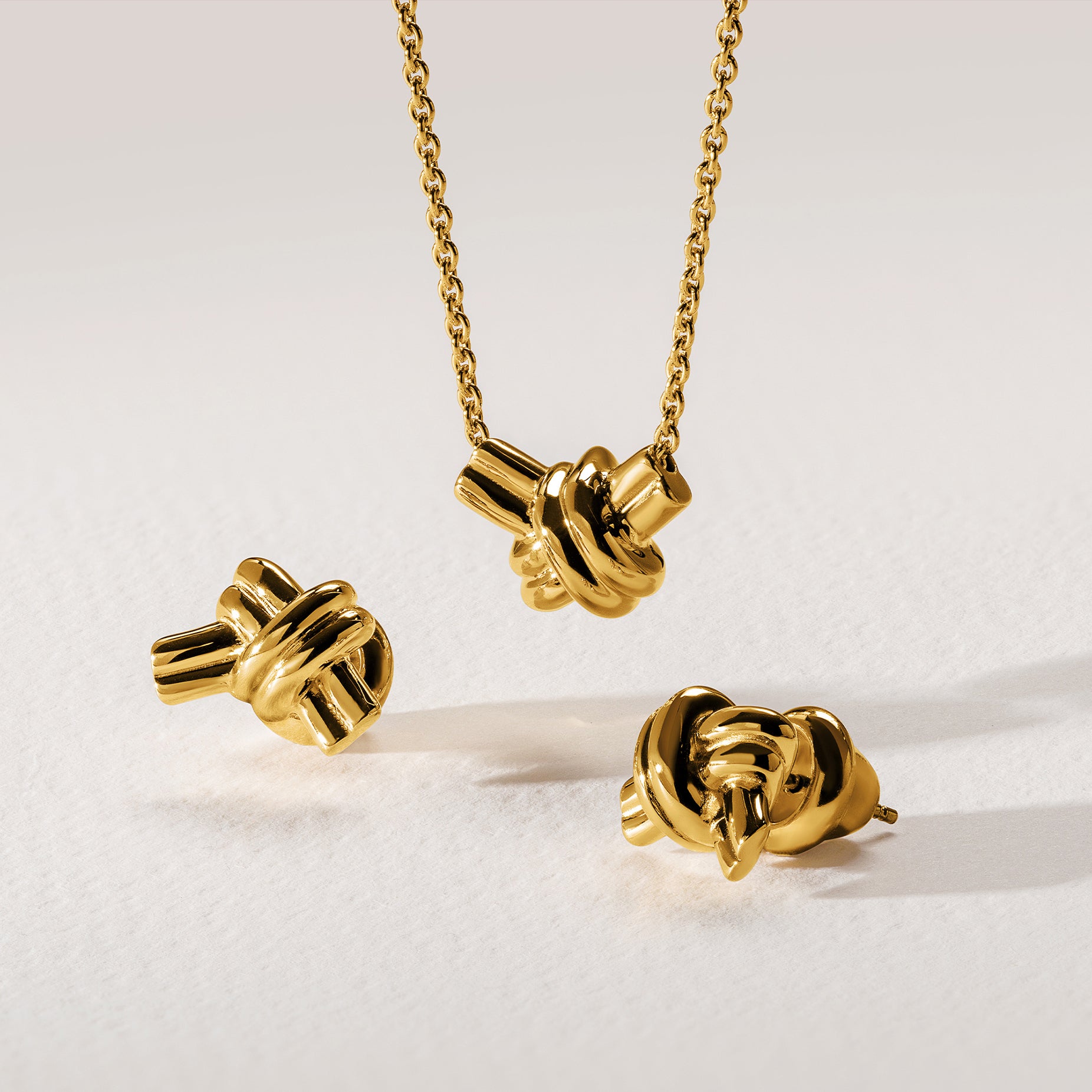 TIED GOLD PENDANT