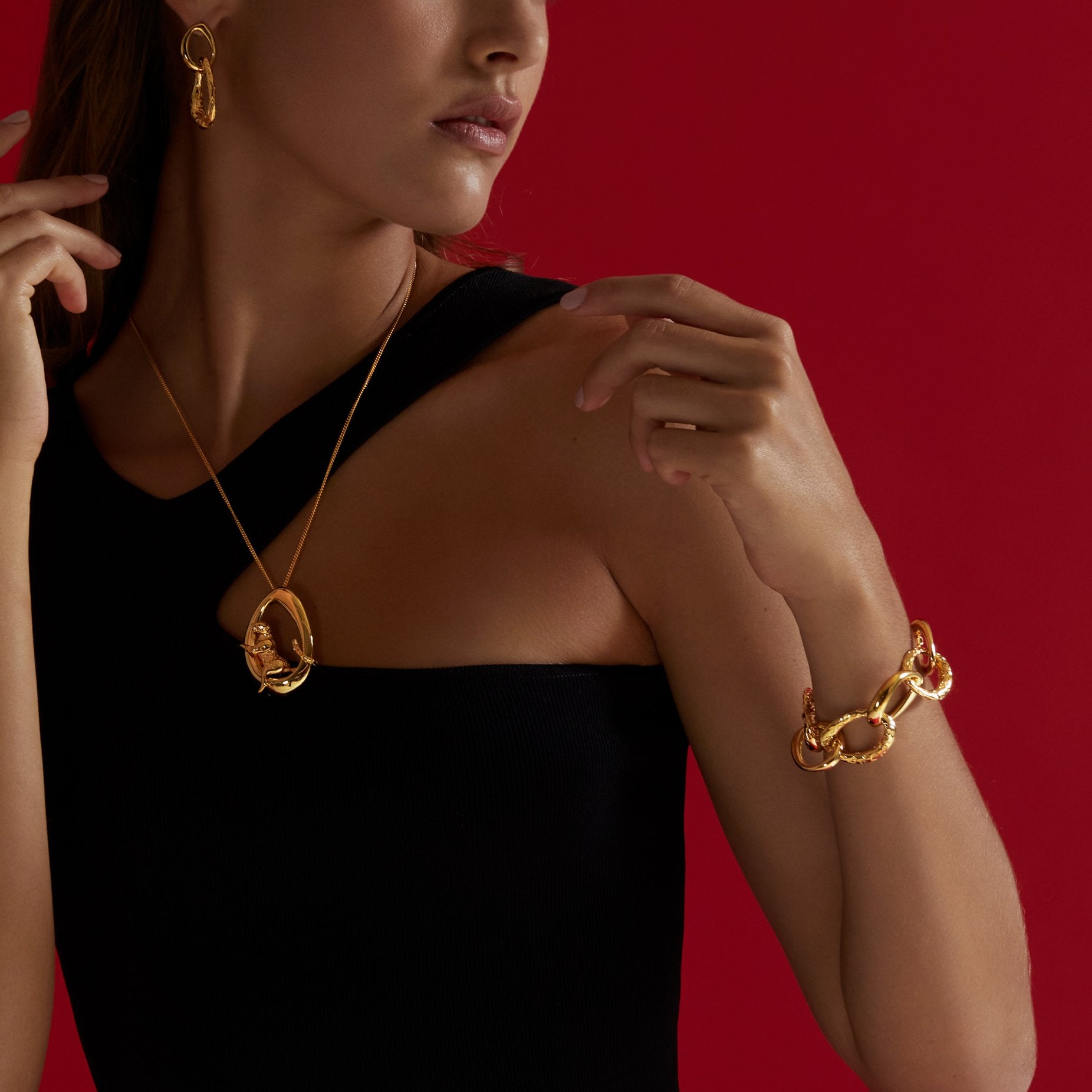 JAGUAR GOLD EARRINGS