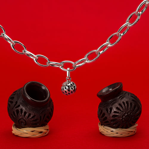 BLACK CLAY CHARM
